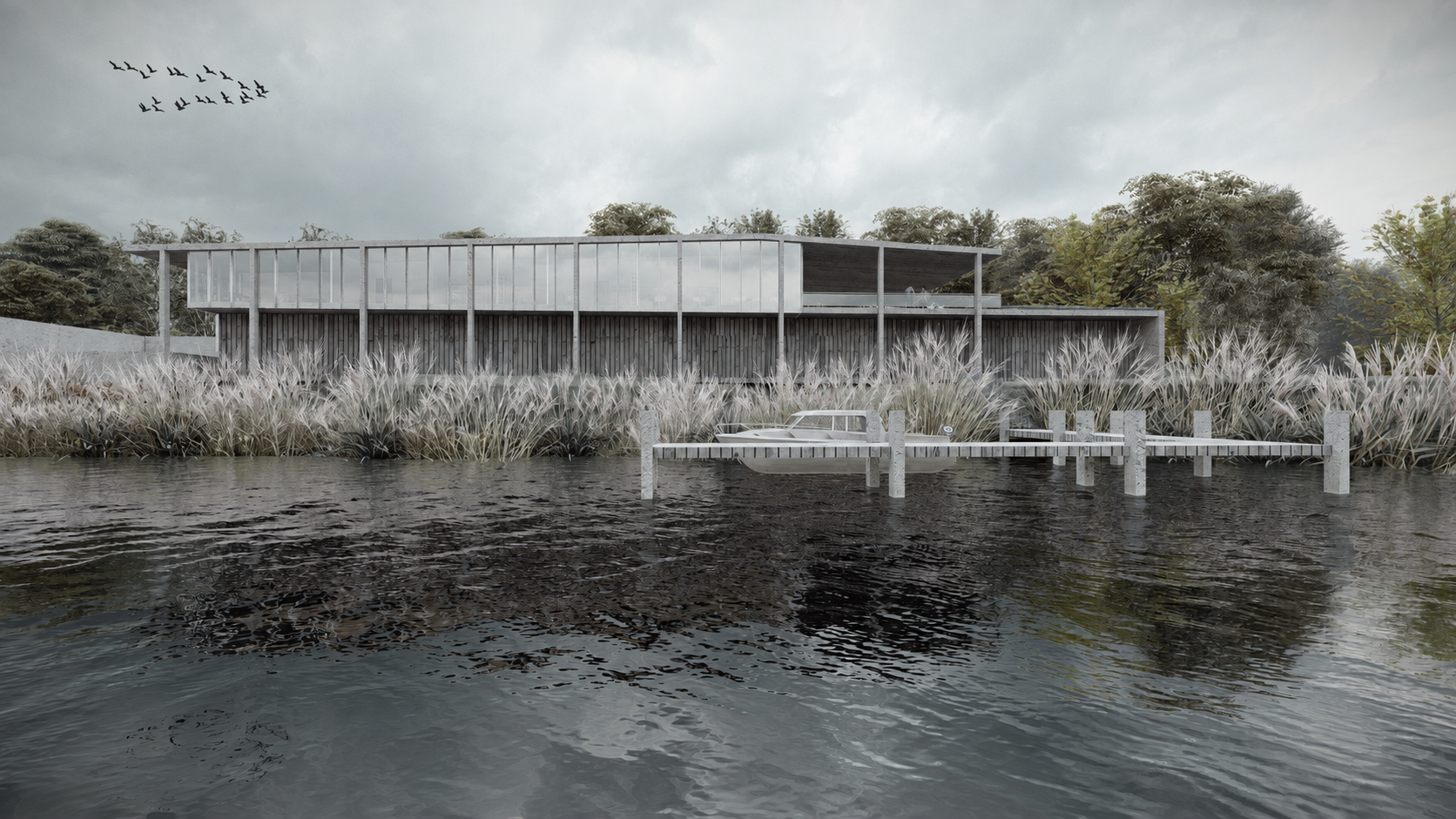Bygningen sett fra vannet med brygge og båt i forgrunnen